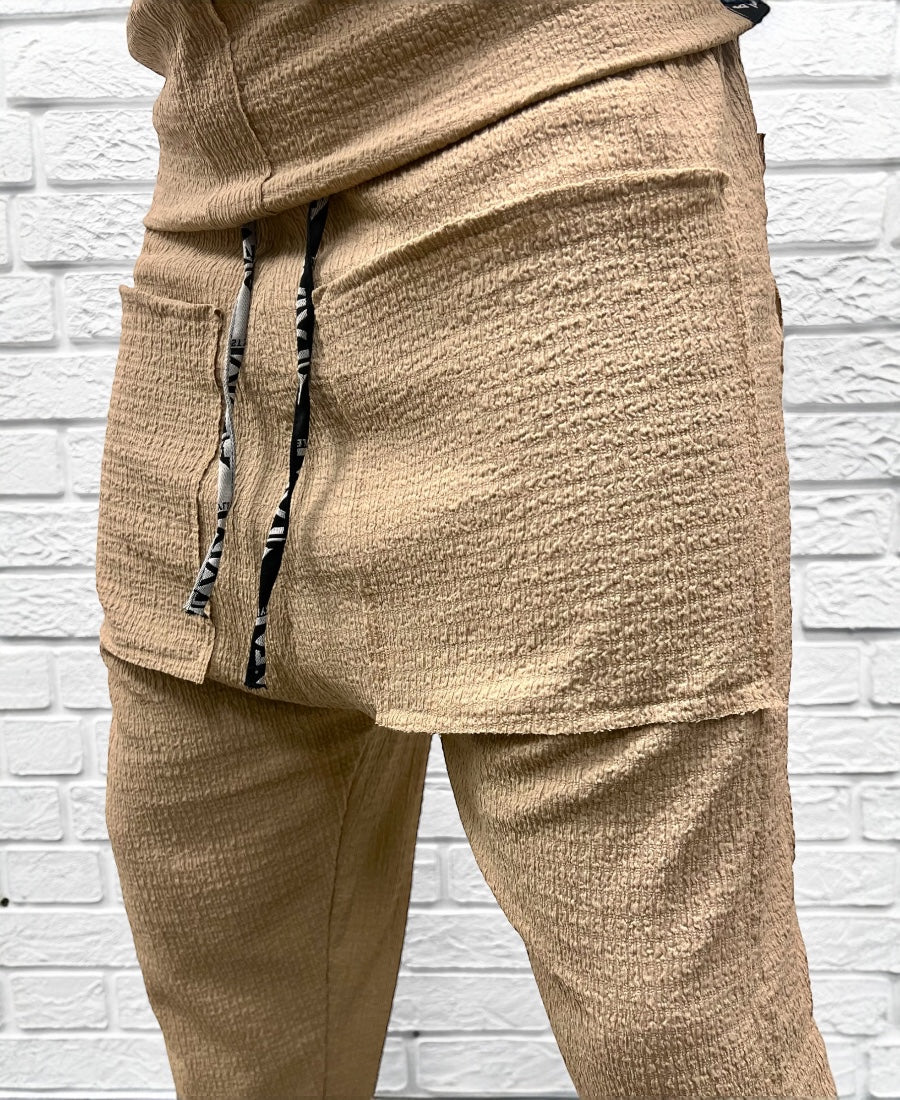 Pantaloni crem din material vaporos