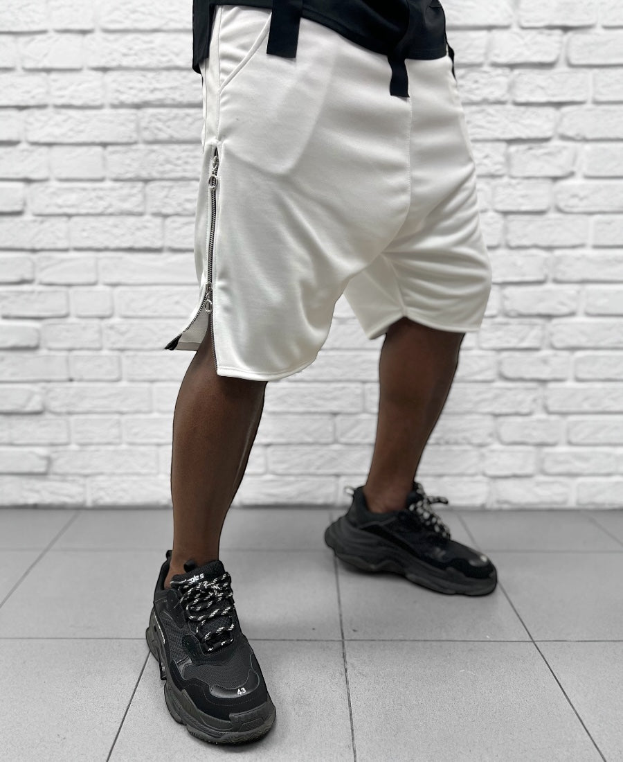 Pantaloni albi cu fermoar lateral