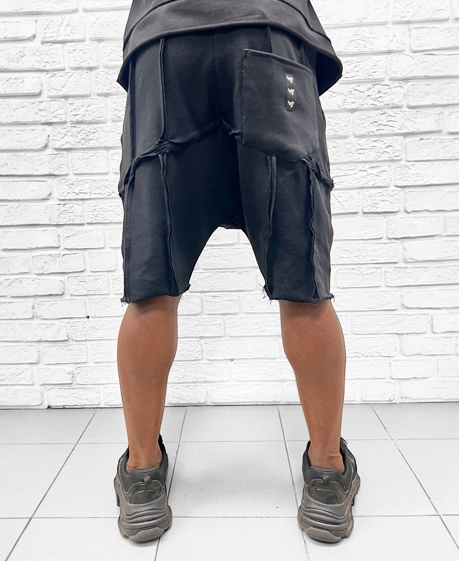 Pantaloni negri cu multiple taieturi