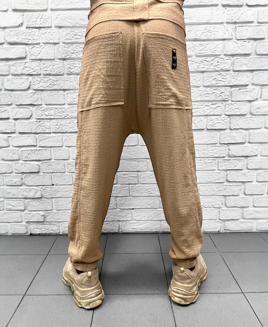 Pantaloni crem din material vaporos