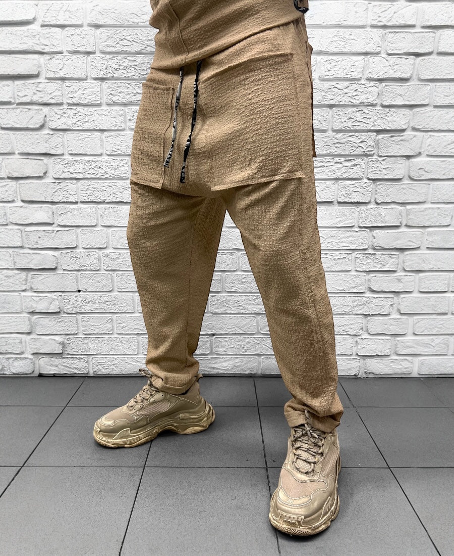 Pantaloni crem din material vaporos