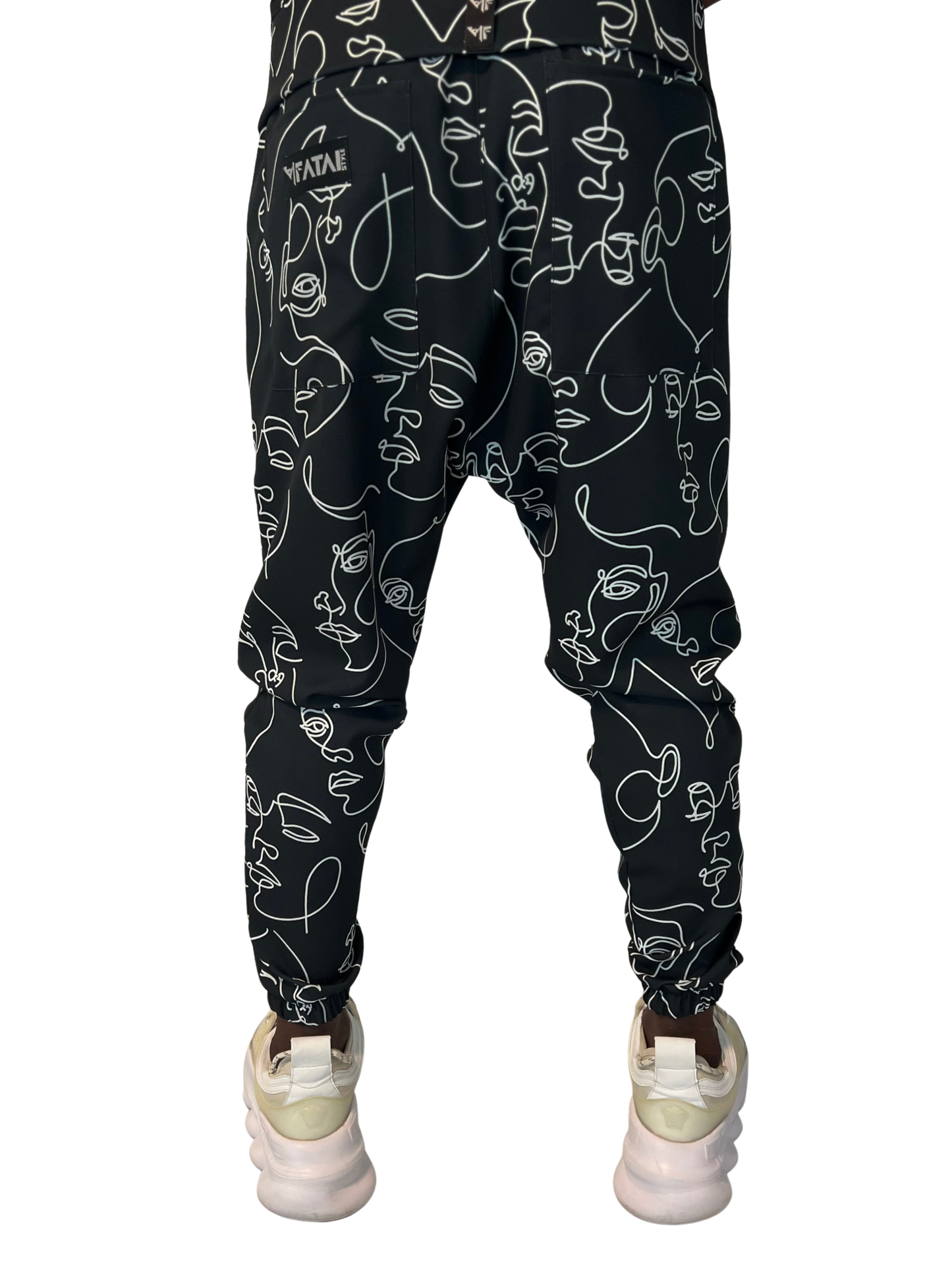 Pantaloni negri cu design geometric