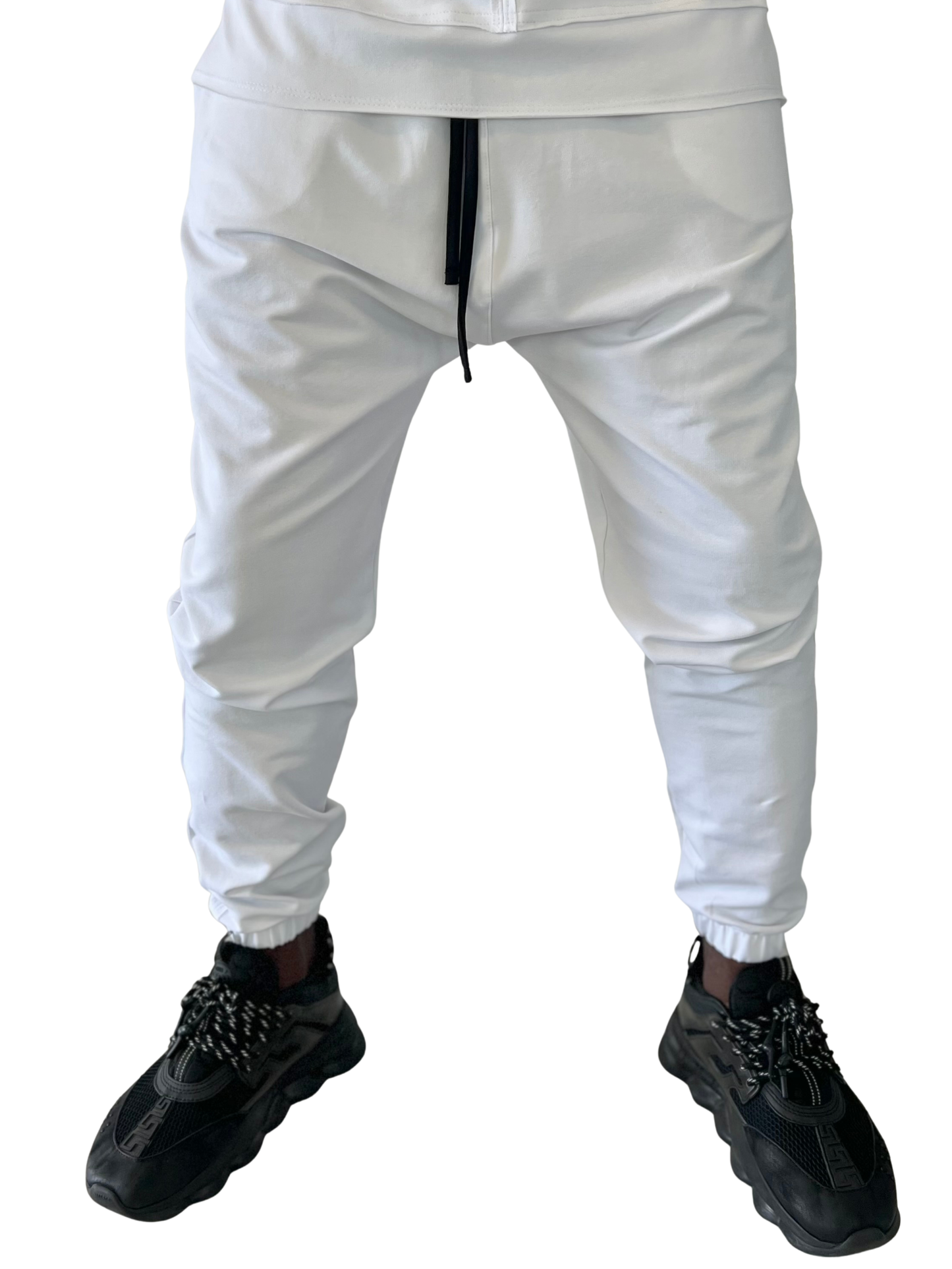 Pantaloni albi cu diverse cusaturi laterale