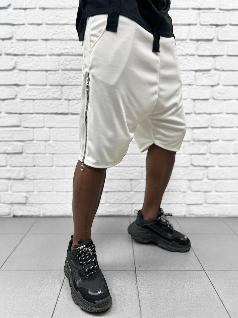 Pantaloni albi cu fermoar lateral