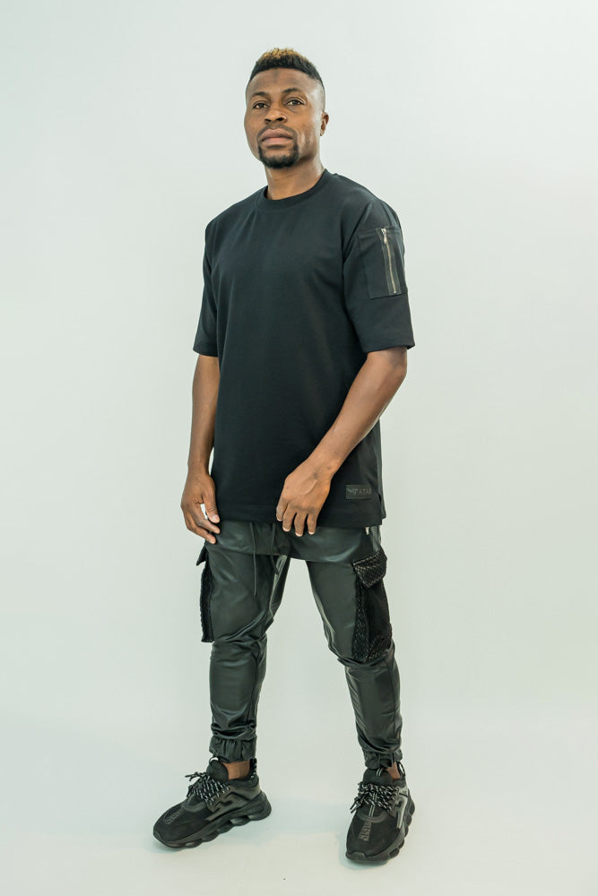 Pantaloni imitatie de piele cu buzunare cu plasa