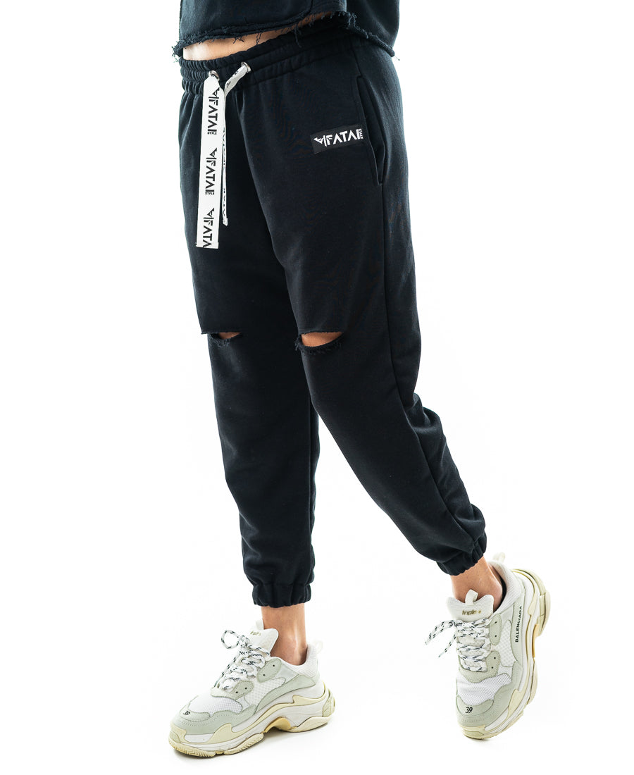 Pantaloni negri cu o taietura pe picior si elastec la glezna