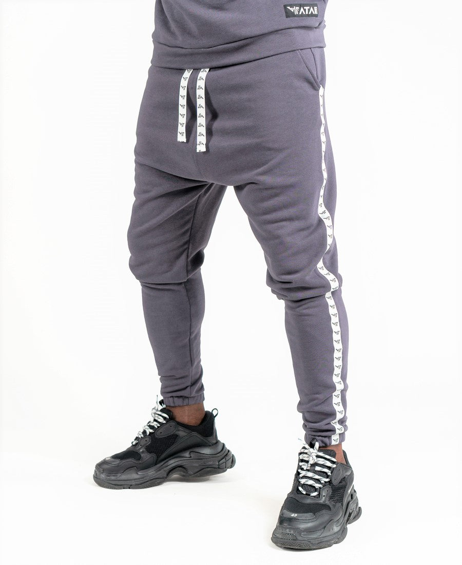 Pantaloni gri cu benzi logo Fatai Style albe laterale