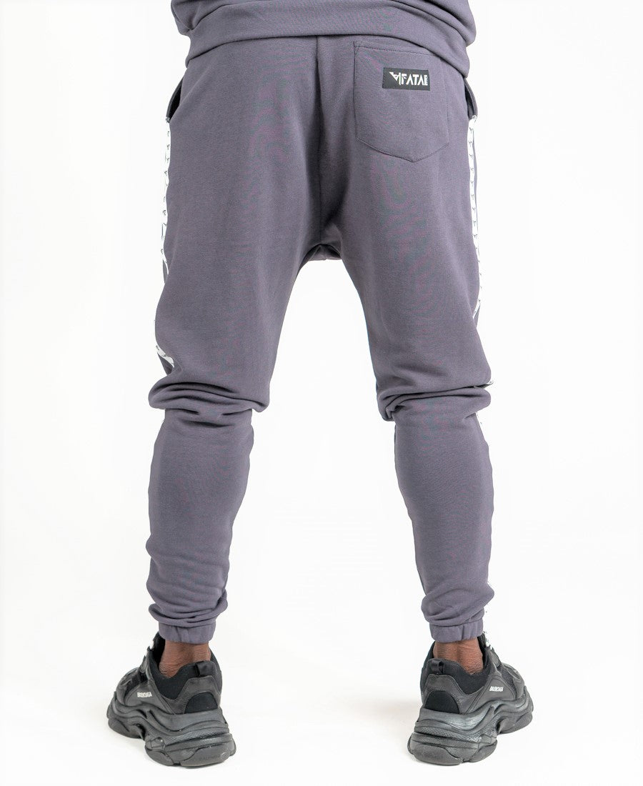 Pantaloni gri cu benzi logo Fatai Style albe laterale