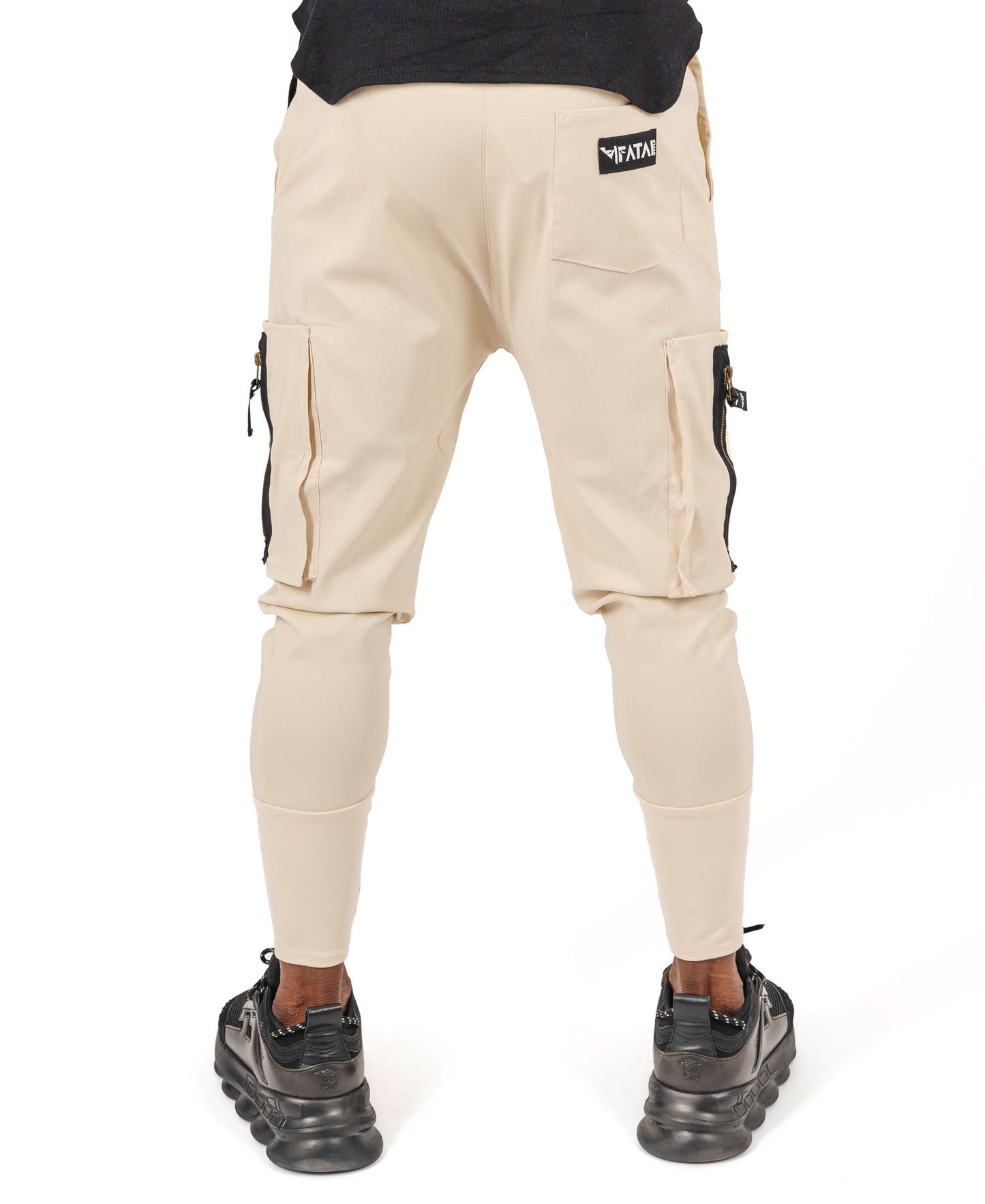 Pantaloni crem cu buzunare laterale si snur cu logo