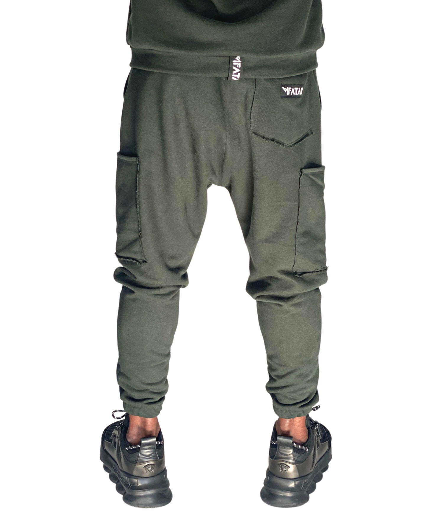 Pantaloni verzi cu buzunare laterale