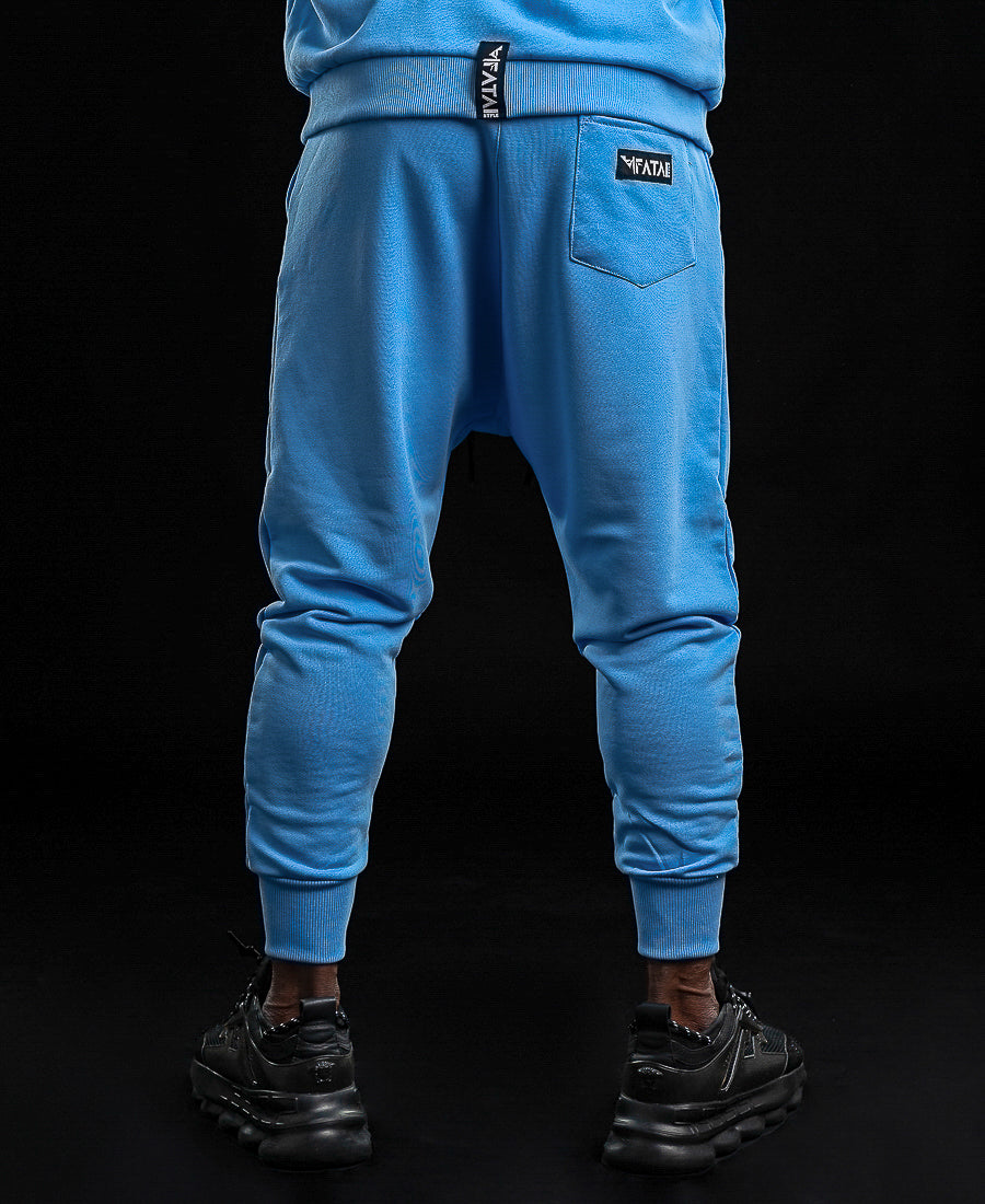 Pantaloni bleu cu text imprimat