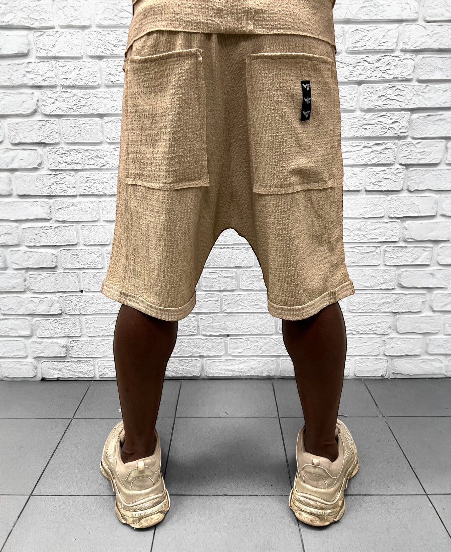 Pantaloni crem din material vaporos