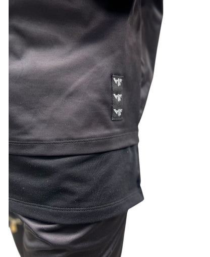 Compleu din doc lucios cu extensie si pantaloni largi cu fermoare
