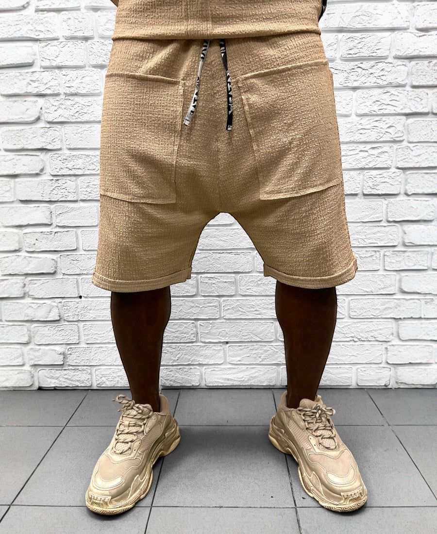 Pantaloni crem din material vaporos