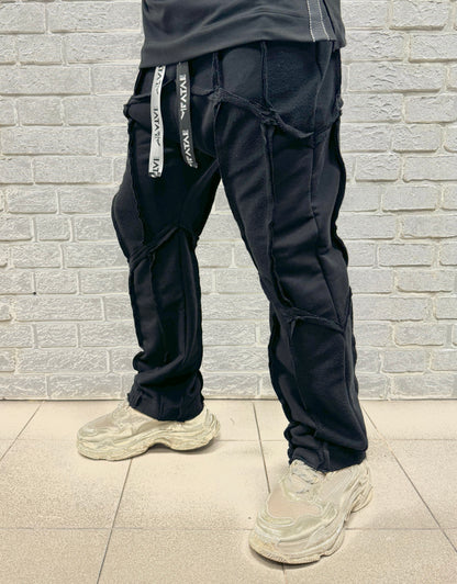 Pantaloni negri cu multiple taieturi • largi