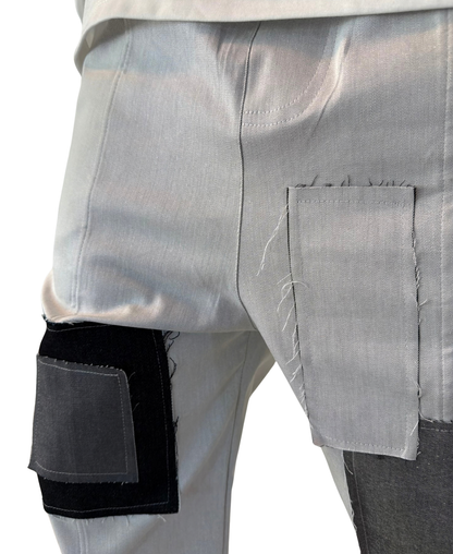 Pantaloni lungi tip blugi cu diverse petice de design
