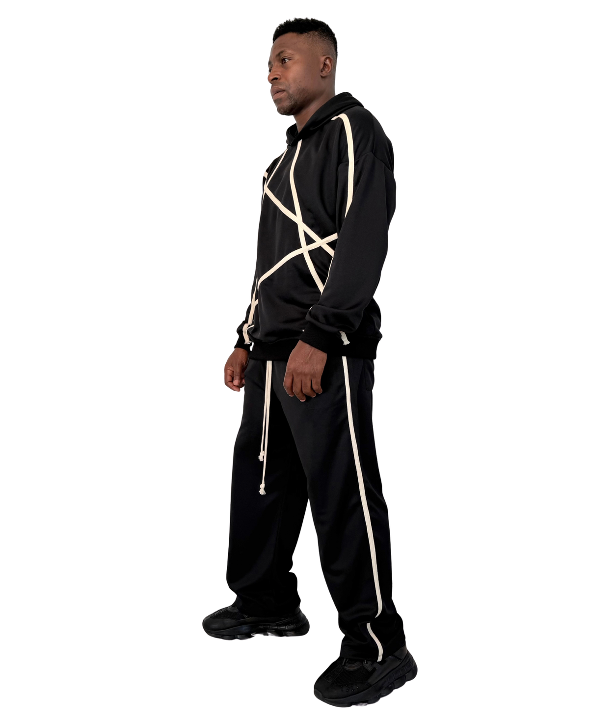 Compleu negru cu pantaloni largi si snururi crem de design