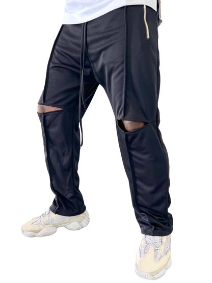 Pantaloni negri cu taietura la genunchi