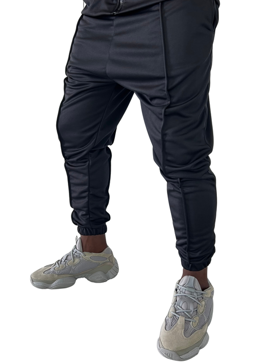 Pantaloni negri cu elastec si dunga ca design