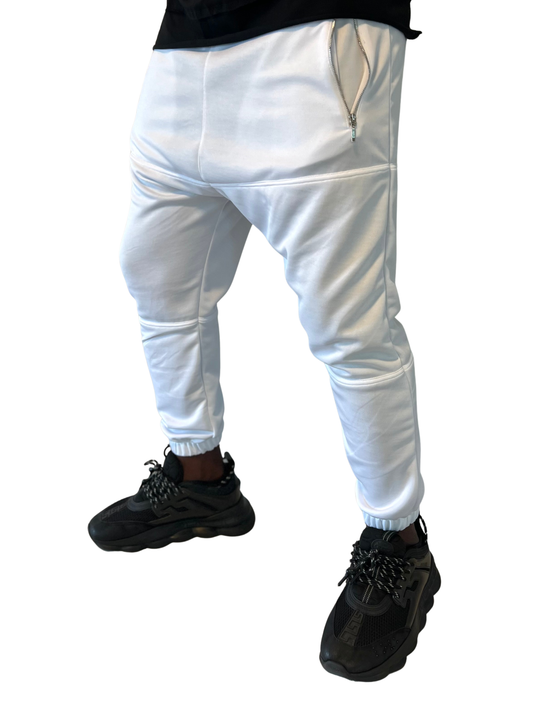 Pantaloni albi cu diverse cusaturi orizontale