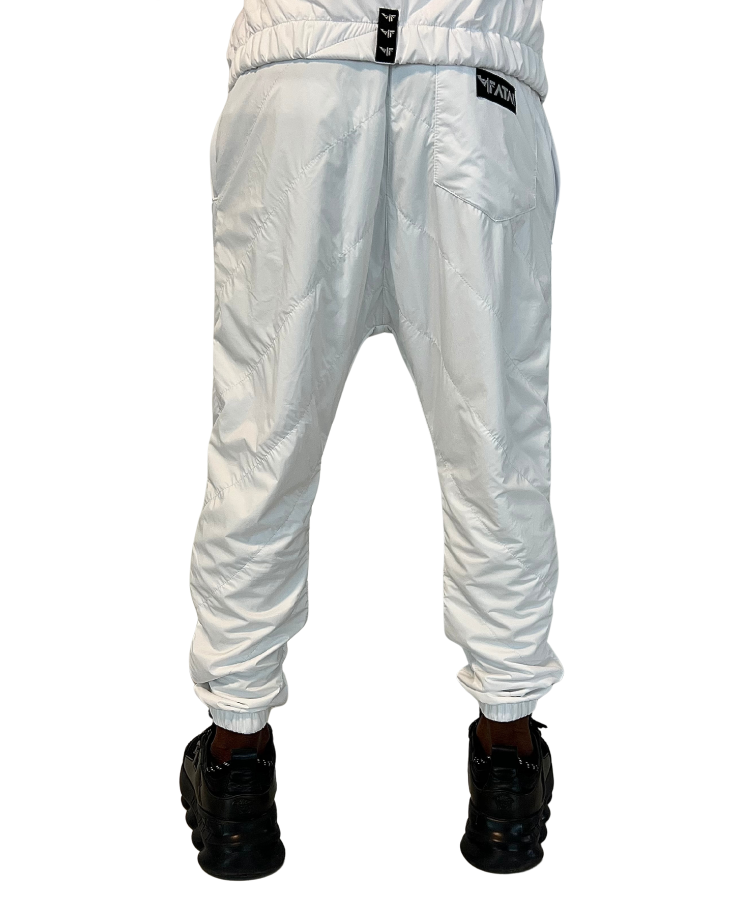 Pantaloni albi complet de fas