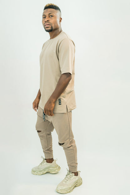 Pantaloni cappuccino cu taietura la genunchi
