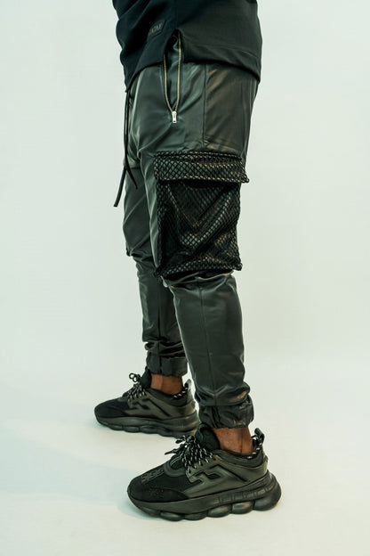 Pantaloni imitatie de piele cu buzunare cu plasa