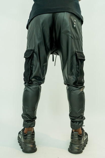 Pantaloni imitatie de piele cu buzunare cu plasa