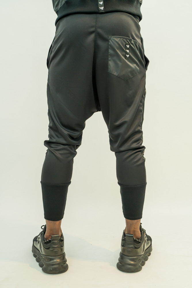 Pantaloni in combinatie de fas cu design din fermoare