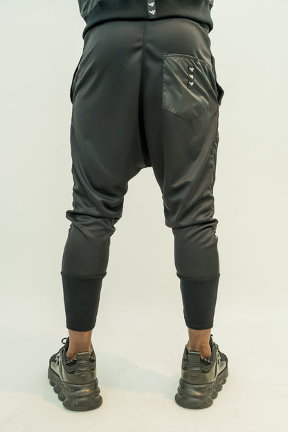 Pantaloni in combinatie de fas cu design din fermoare