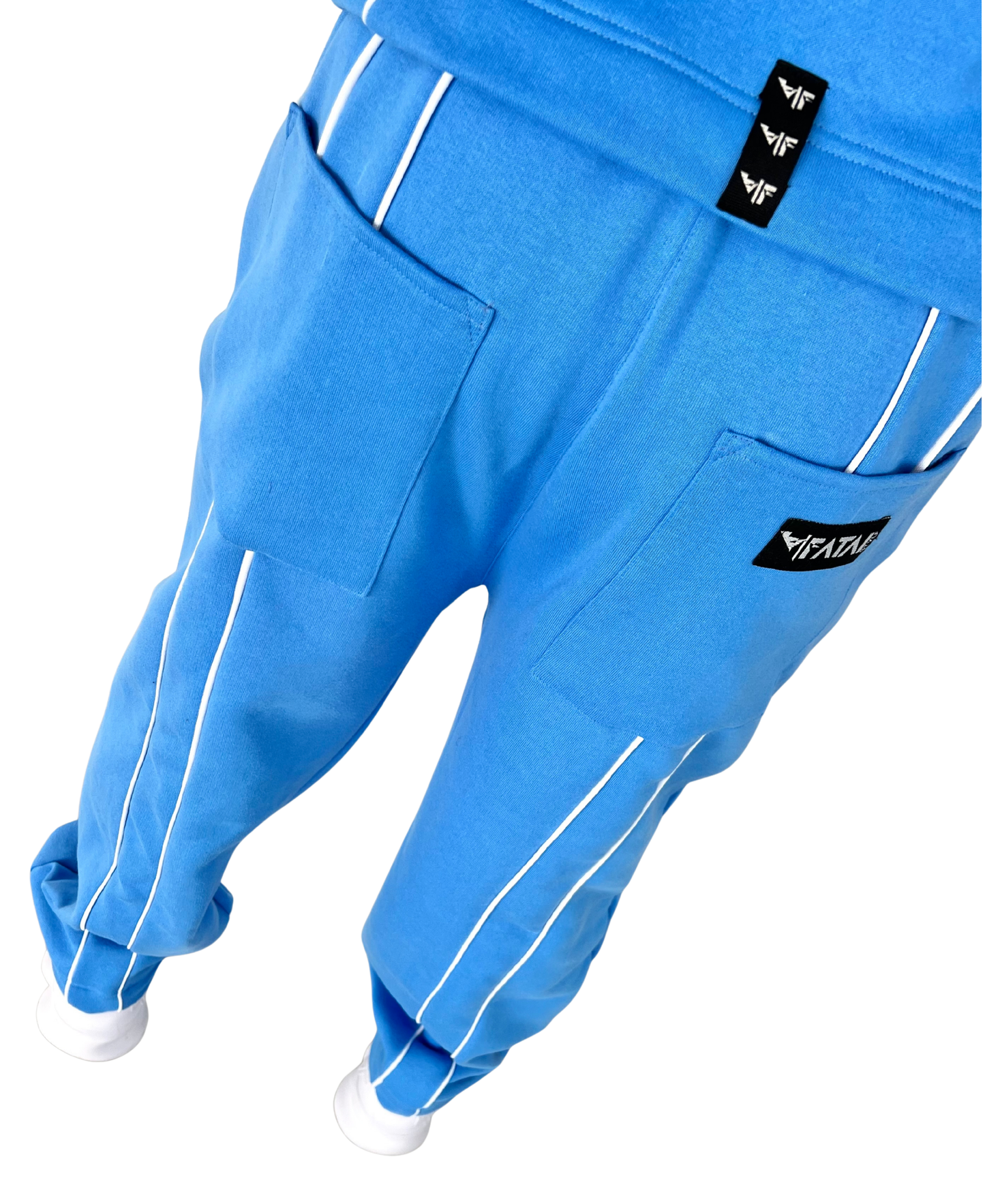 Pantaloni bleu cu detalii albe