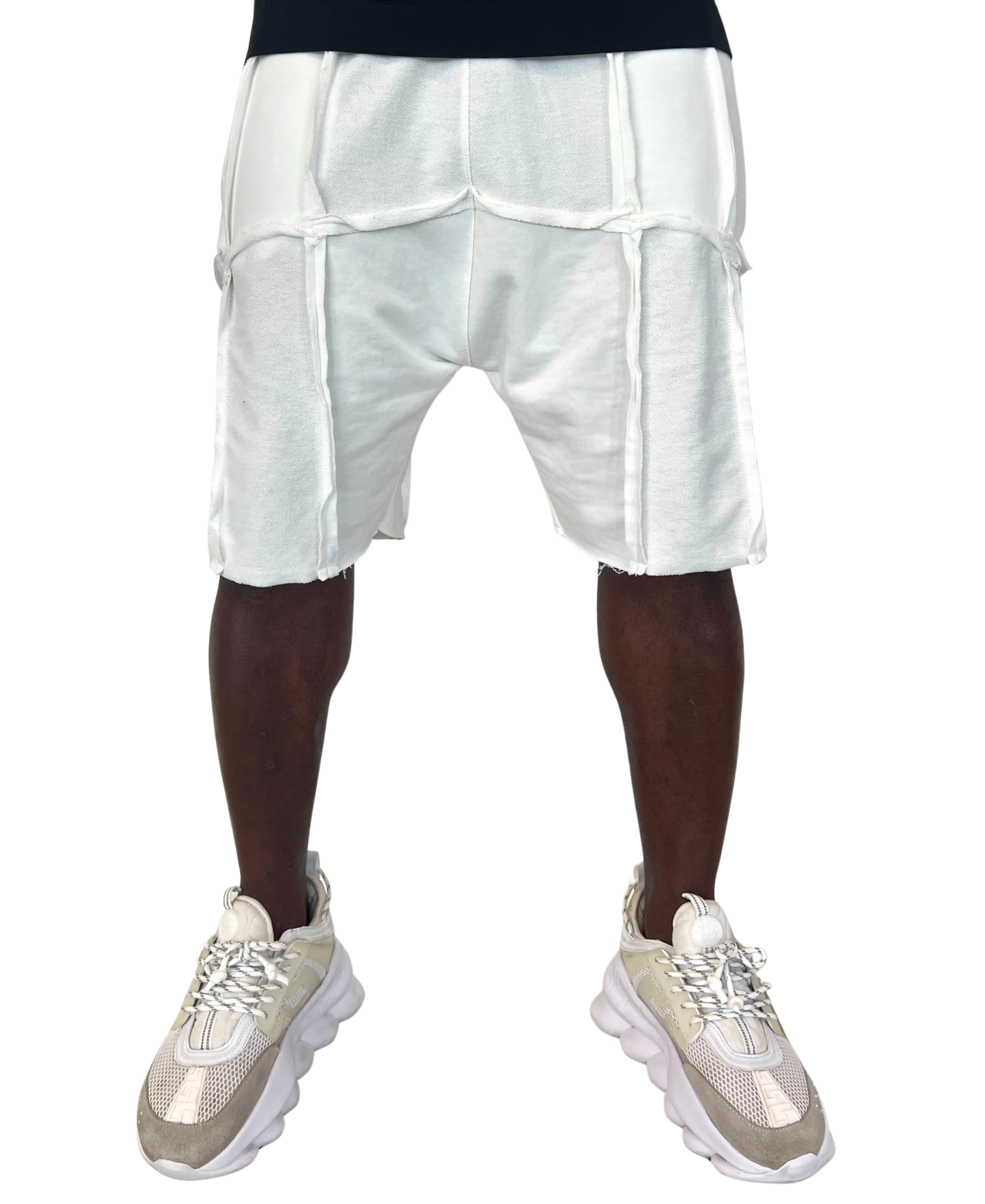 Pantaloni albi cu multiple taieturi