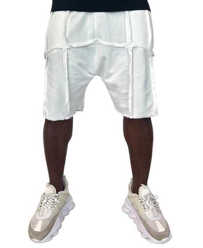 Pantaloni albi cu multiple taieturi