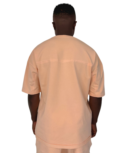 Tricou cu diverse cusaturi in nuanta somon