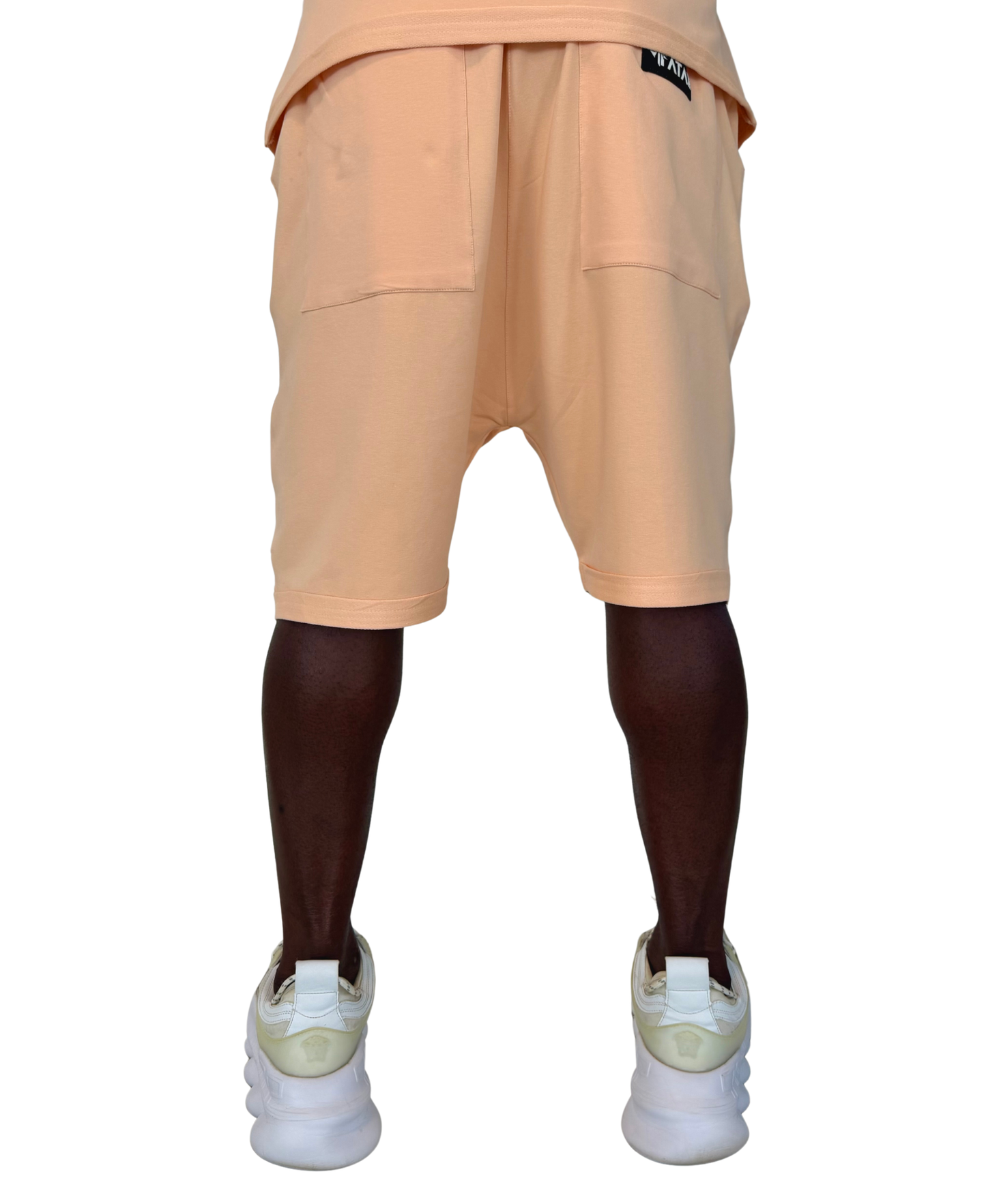Pantaloni scurti cu diverse cusaturi in nuanta somon