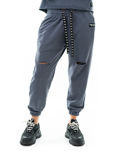 Pantaloni cu o taietura pe picior si elastec la glezna