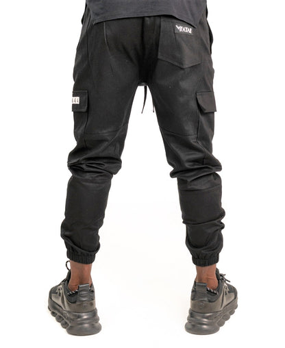 Pantaloni negri cu diverse cusaturi tip blugi