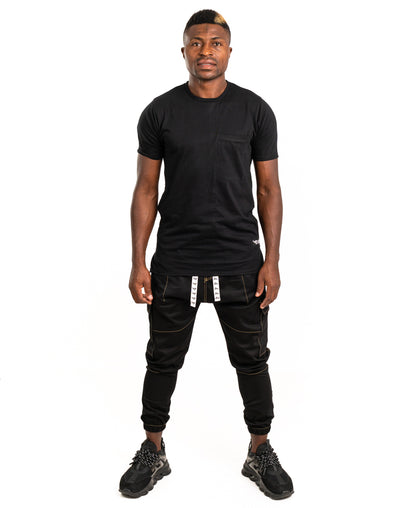 Pantaloni negri cu diverse cusaturi maro tip blugi