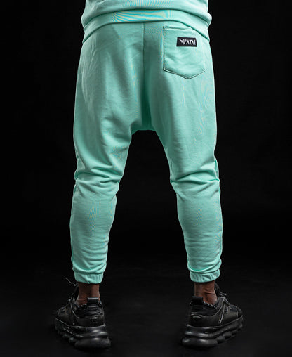 Pantaloni verde menta cu fermoar la buzunare